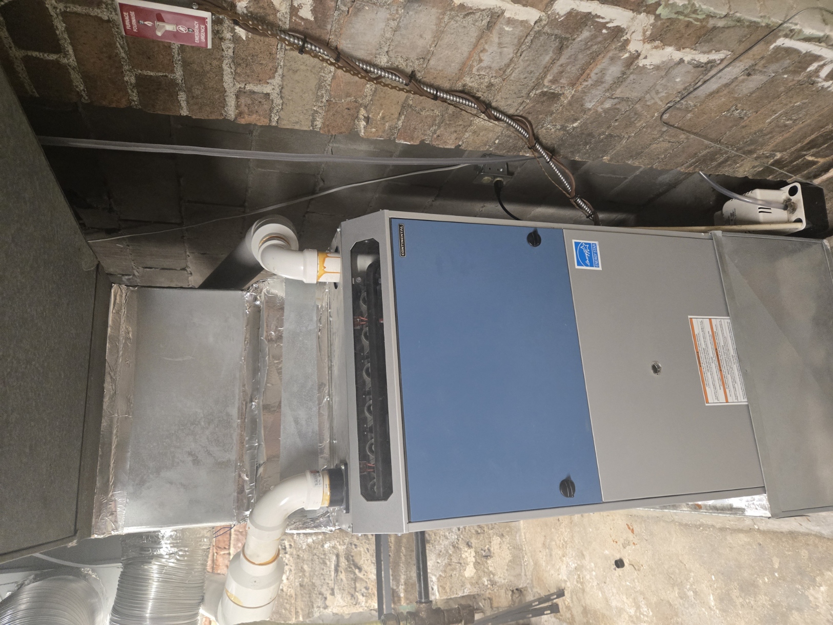Front view of new high-efficiency furnace installation